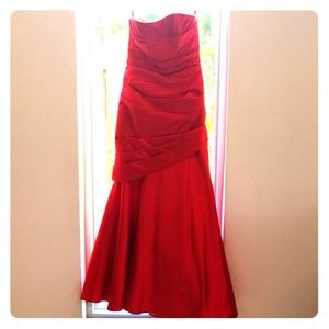 Red Strapless mermaid trumpet gown.